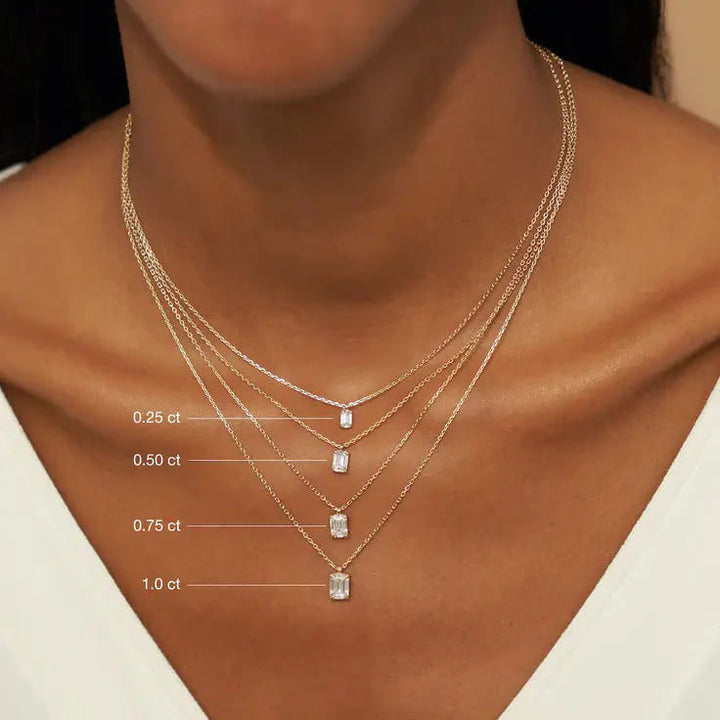 1598318844-solitaire-emerald-diamond-pendant-on-model-carat-comparison