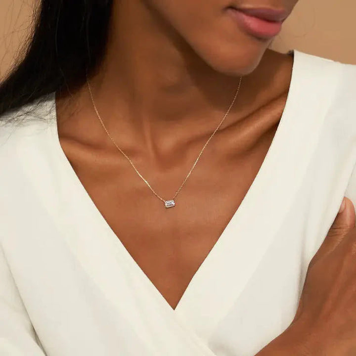1598318353-solitaire-emerald-diamond-necklace-1-ct-on-model