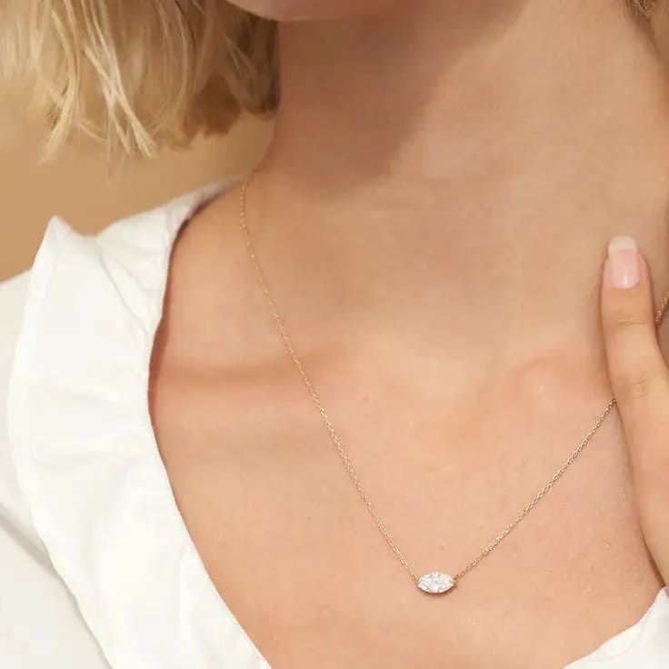 1598317580-solitaire-marquise-diamond-necklace-1ct-on-model-1