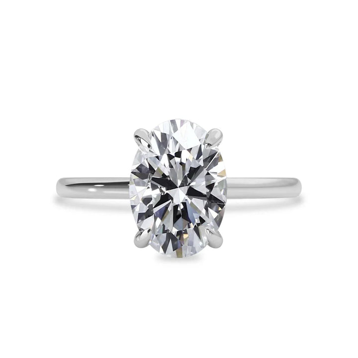 oval-cut-diamond-hidden-halo-ring-white-gold_1500x1500_cd437b07-263d-4856-8b8f-294302c49467